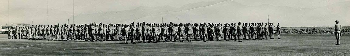 V J Day celebration parade in Cyprus just before going for a church service in the hangar. September, 1945.